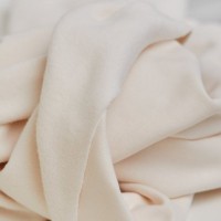 Tissu sweat brossé creamy white